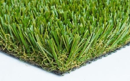 Close-up of synthetic green artificial grass blades.