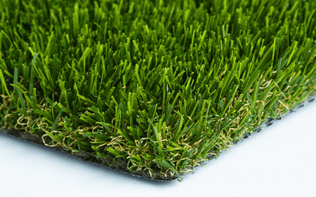 Close-up of artificial green turf with dense grass blades.