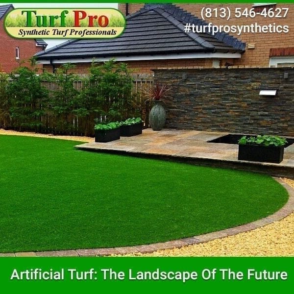 Artificial turf installed in a backyard for a clean, green landscape.