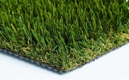 Close-up of green artificial turf with detailed grass blades.