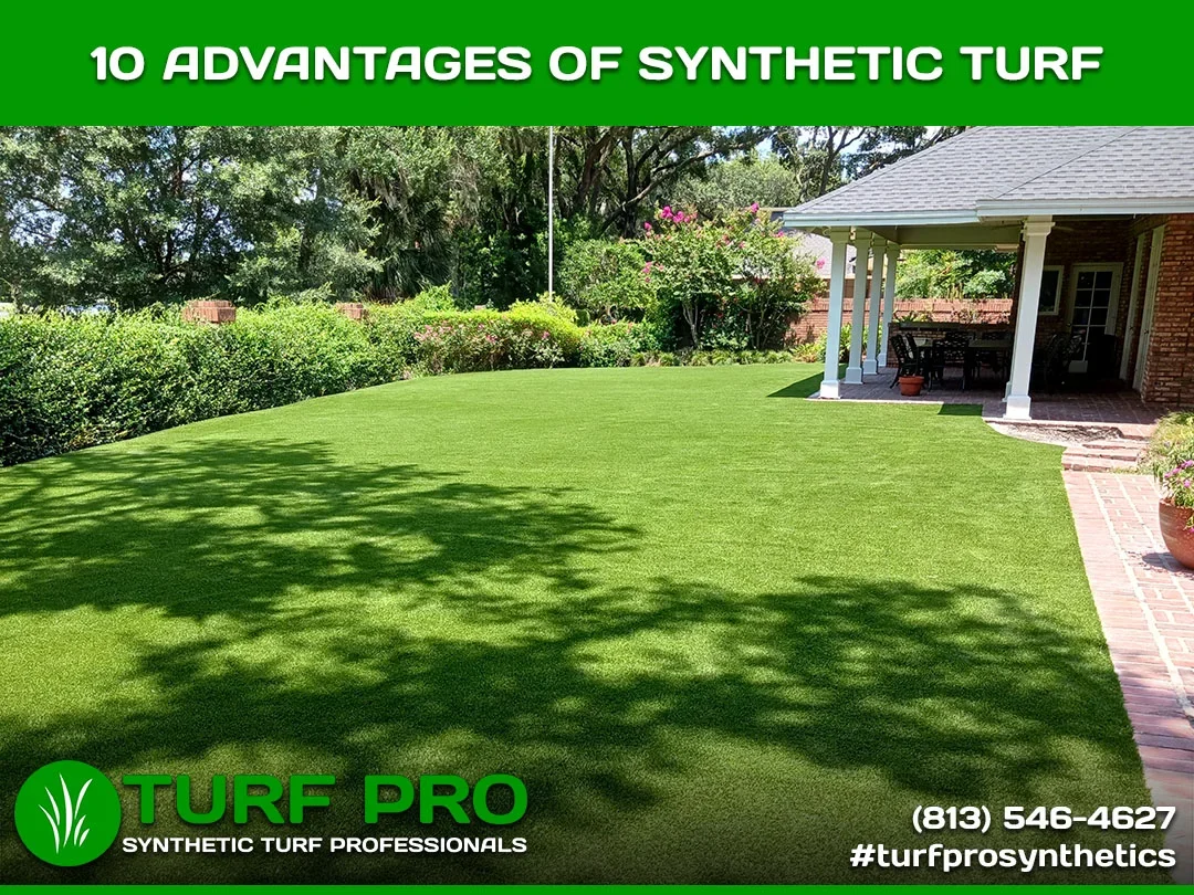 Lush green synthetic turf lawn with garden and gazebo.